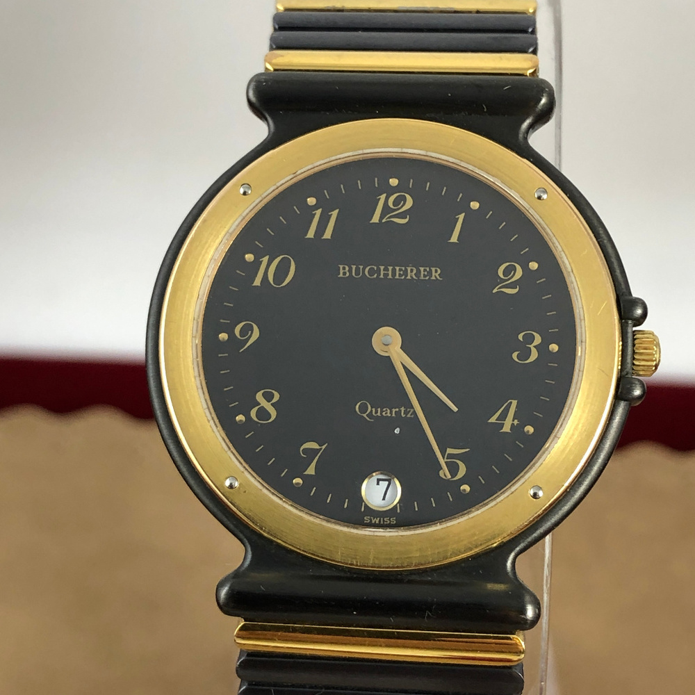 Carl Bucherer Gold and Black Swiss Watch Swiss 6 Jewel Quartz Movement